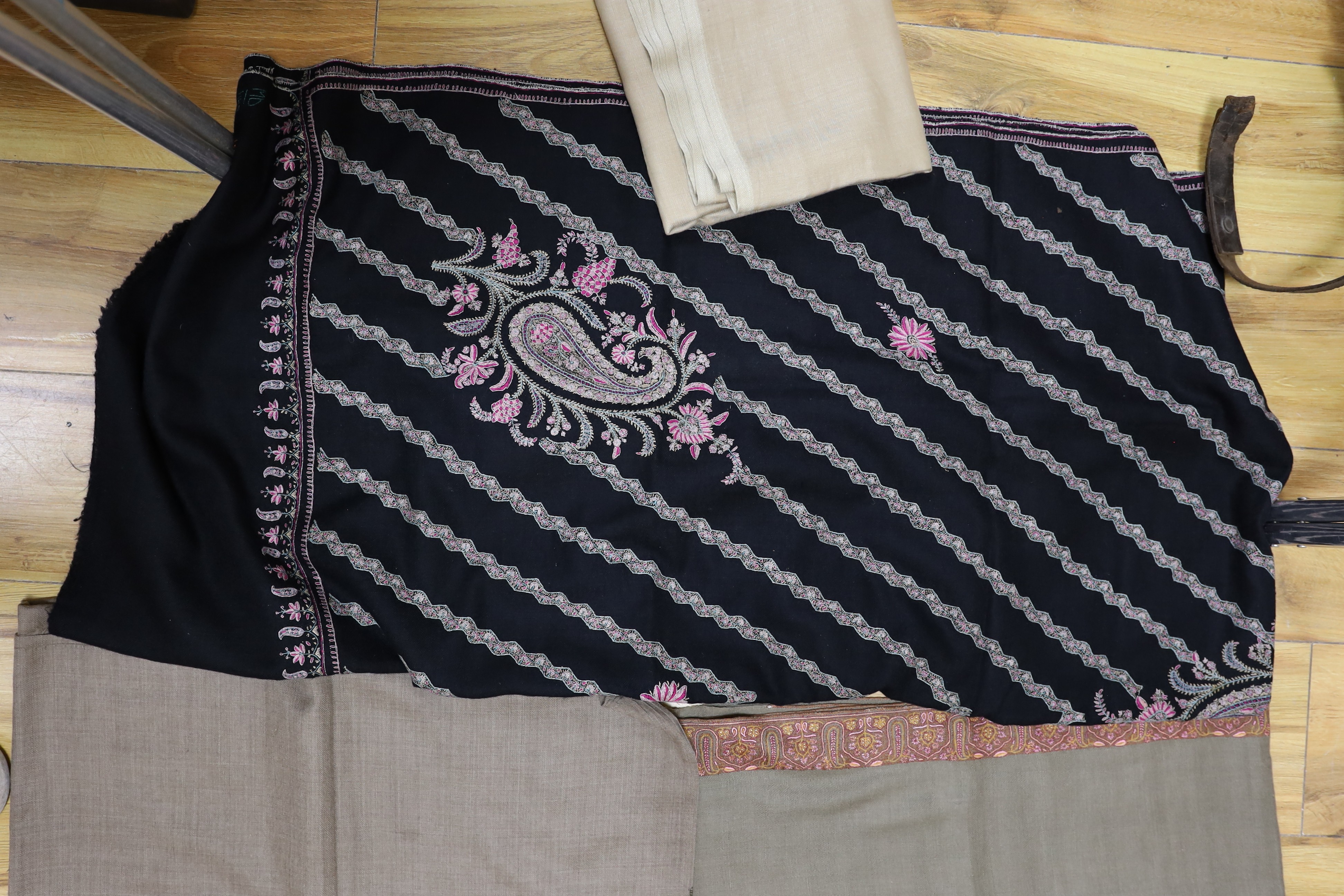 Four Indian wool and cashmere shawls, three silk embroidered